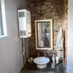 triton off grid container home bathroom