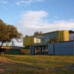 Huiini Shipping Container House front and backyard view