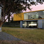 Huiini Shipping Container House front glass walls