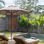 bali container villas exterior pool chairs