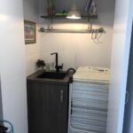 bushland beach container home laundry