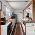 naylor container home interior kitchen left