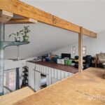 naylor container home wooden beam