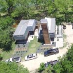 dam camp container home aerial angled