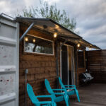 dam camp container home exterior chairs