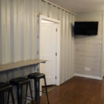 dam camp container home wall bar
