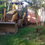 roatan container cabins backhoe pull