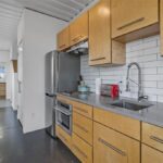 3327 rutledge street container home kitchen angled