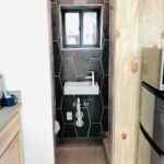 east atomic ranch shipping container bathroom sink