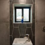 east atomic ranch shipping container bathroom tile