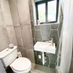 east atomic ranch shipping container bathroom toilet