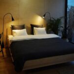 poznan riverfront cabins bed evening