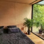 poznan riverfront cabins bed patio