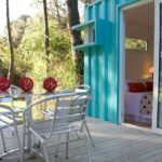 alterra pinamar container glamping patio chairs