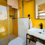 bergheim container lofts yellow bathroom