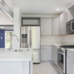 Camden Avenue Container House kitchen white cabinet