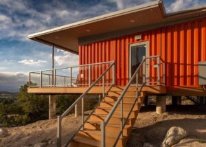 Salida Shipping Container Home exterior staircase piers