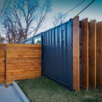 Tiny Slice of Heaven exterior wooden fenced wall design