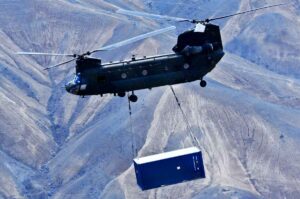 container delivery via helicopter