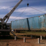 containers of hope construction crane