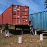 containers of hope construction piles