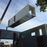 foster container home construction crane