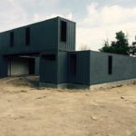 foster container home construction stacked boxes