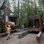 six oaks container home construction crane