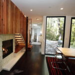six oaks container home fireplace